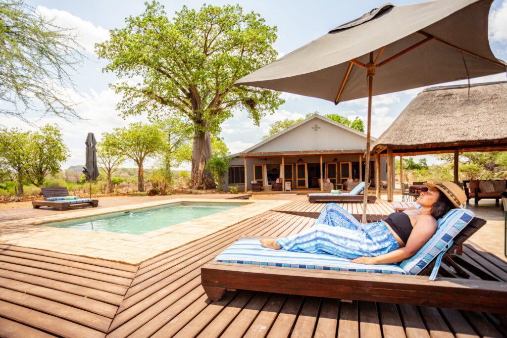 Wide shot of the pool and sun loungers around the pool. at Baobab Hill House, Pafuri