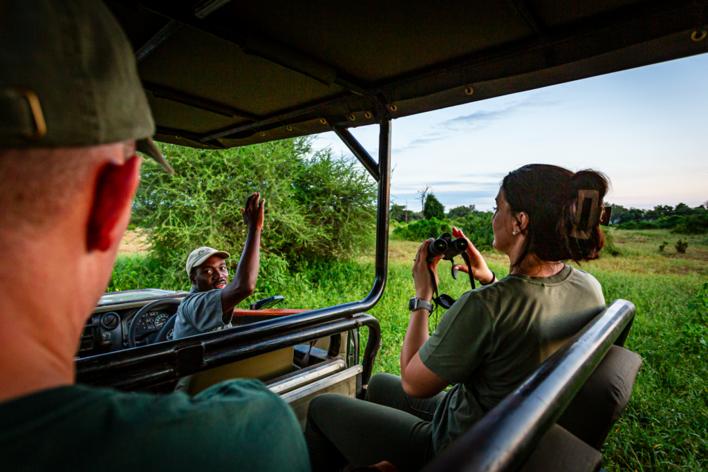 Private guide and safari vehicle departing Baobab Hill House for a game drive